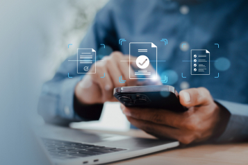 Mobile OCR document scanning technology for digital paperwork , digital paperwork management, showing business professional using smartphone